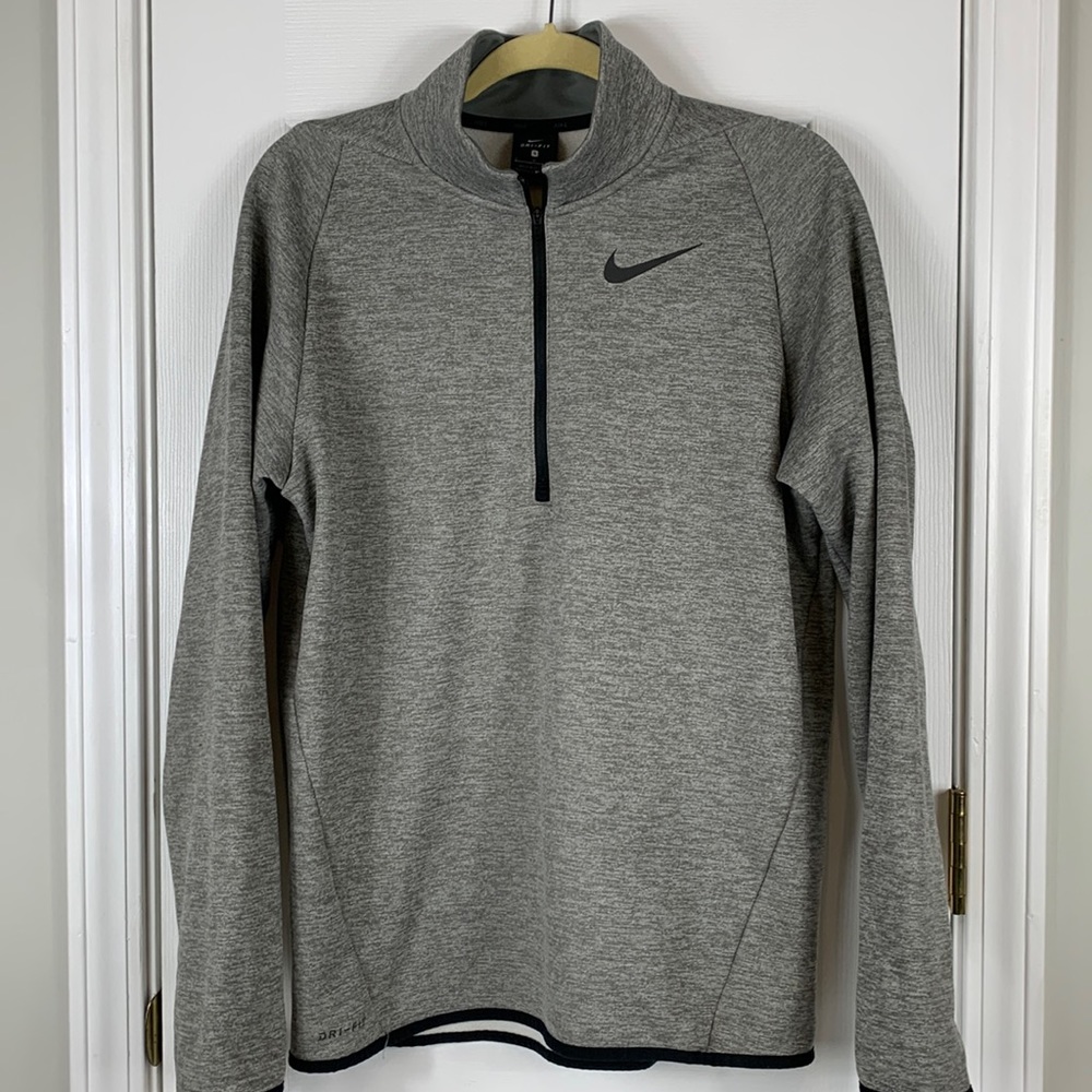 Nike dri-fit heather grey long sleeved 1/2 zipper pullover size small. Polyester